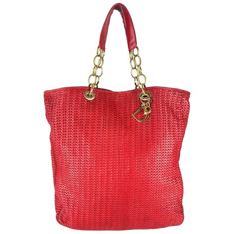 red christian dior|christian dior red woven bag.